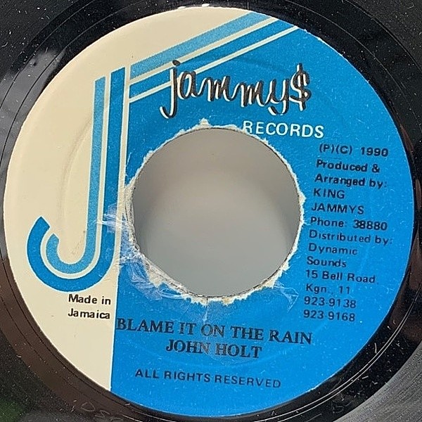 レコードメイン画像：【ルーツなリズムともにレイジーなベテランの味わいたっぷり】7'' JAオリジナル JOHN HOLT Blame It On The Rain ('90 Jammy's) 45's